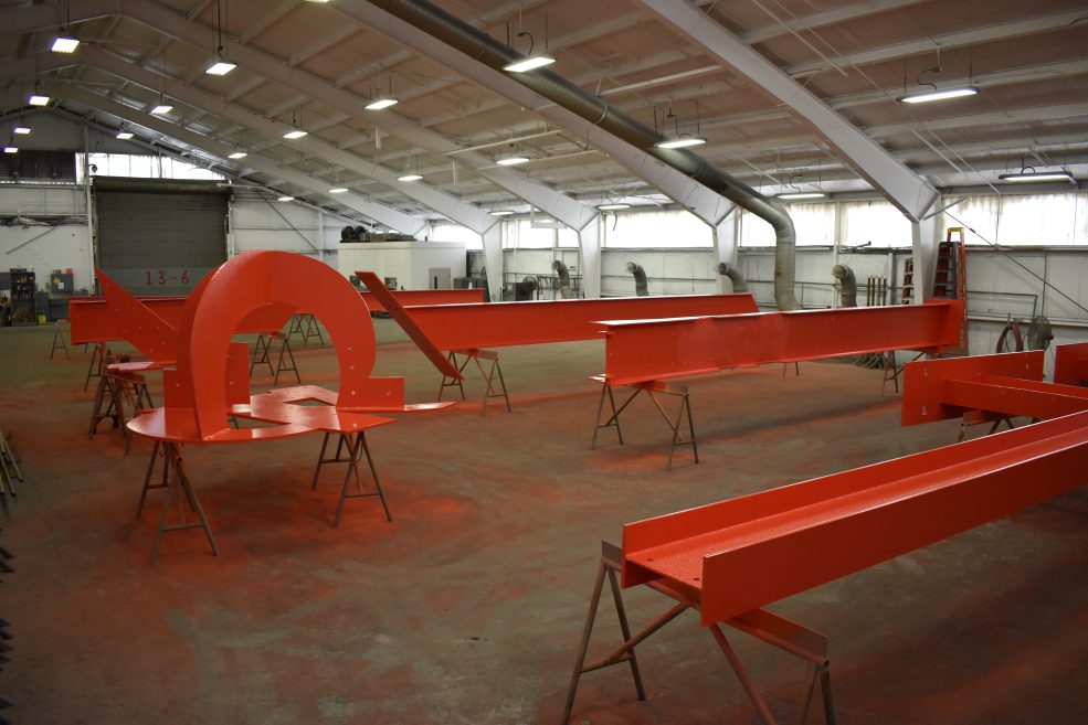 <em>Iroquois</em> paint restoration in August 2022 at the Color Works industrial paint facility in Delaware. Photo by Ashley Lippolis for the Association for Public Art.