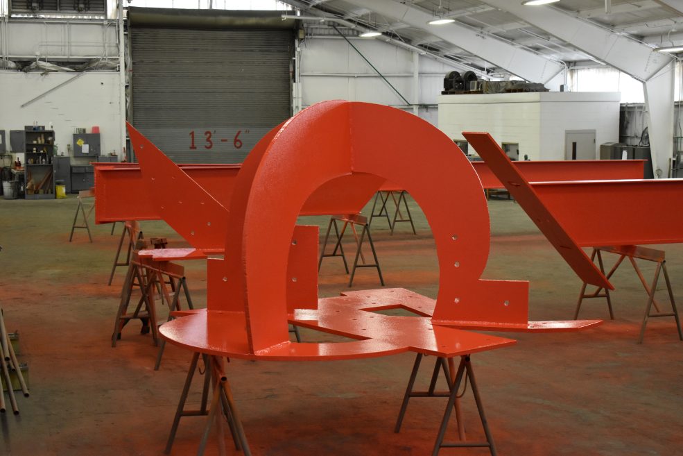 <em>Iroquois</em> paint restoration in August 2022 at the Color Works industrial paint facility in Delaware. Photo by Ashley Lippolis for the Association for Public Art.