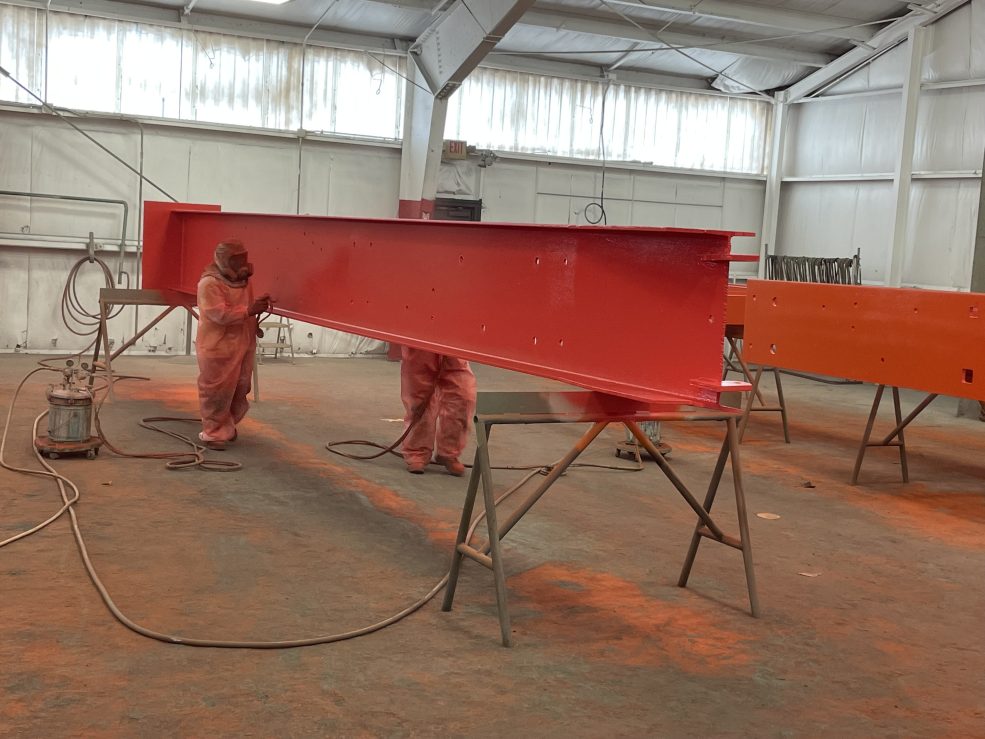 <em>Iroquois</em> paint restoration in August 2022 at the Color Works industrial paint facility in Delaware. Photo courtesy Materials Conservation.