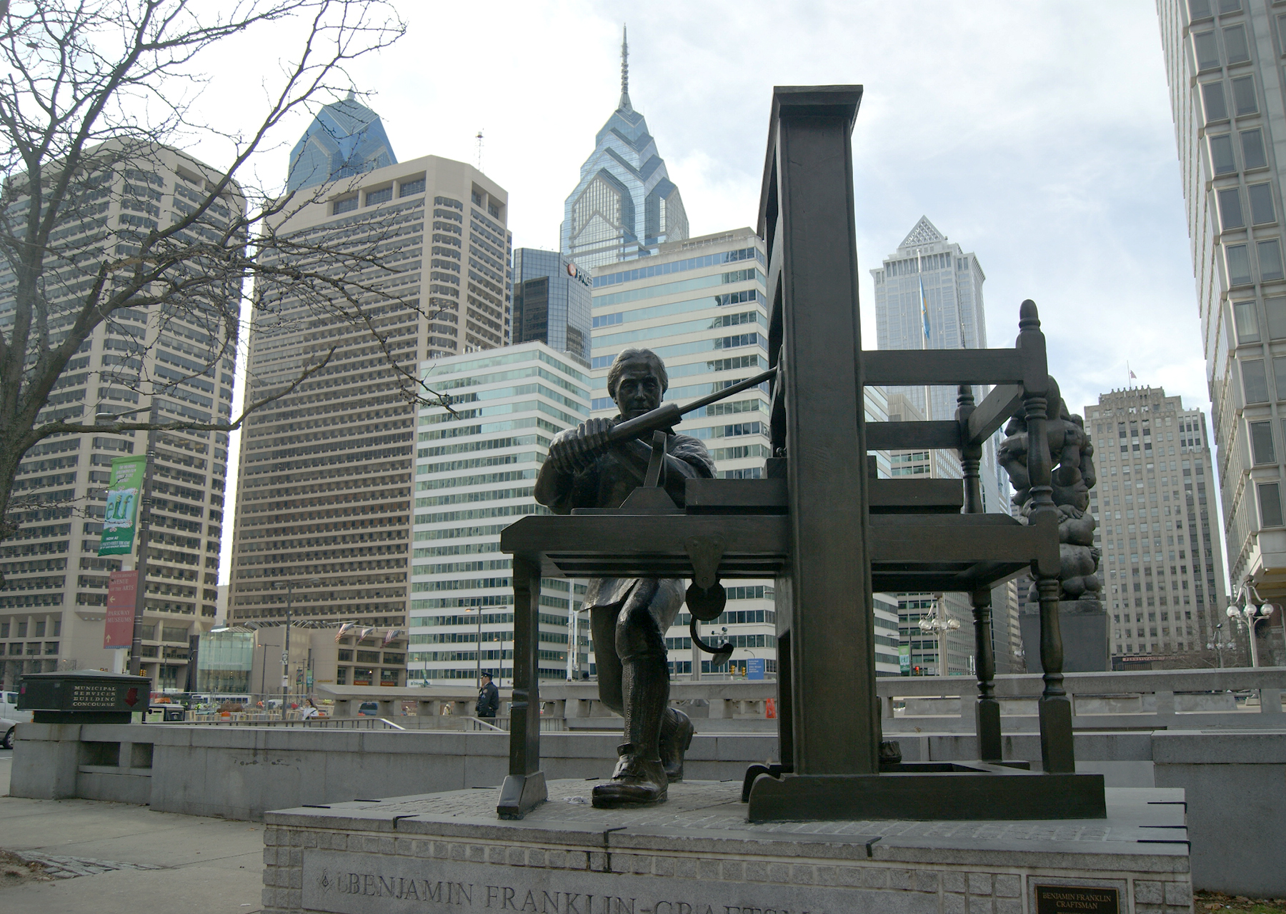 Sculpture of a young Benjamin Franklin working a printing press in Center City Philadelphia
