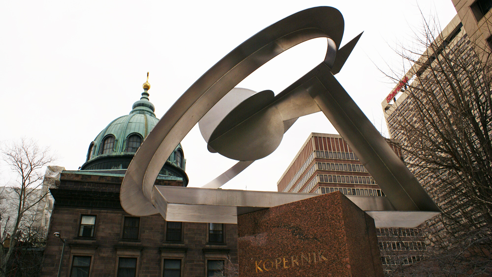 Dudley Talcott's Kopernik sculpture with the Cathedral Basilica of Saints Peter & Paul