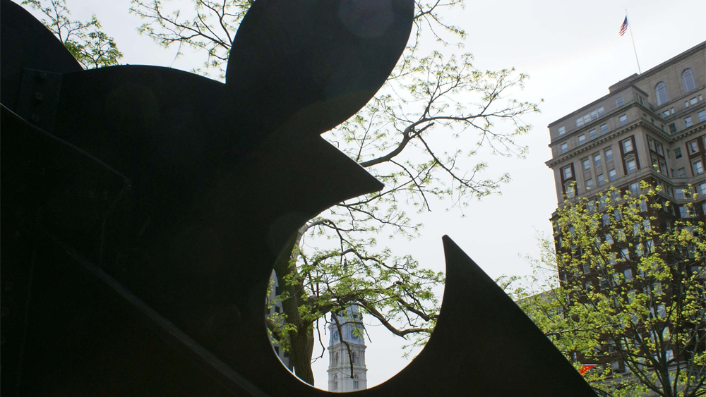 Viewing the statue of William Penn atop Philadelphia's City Hall through Three Discs, One Lacking
