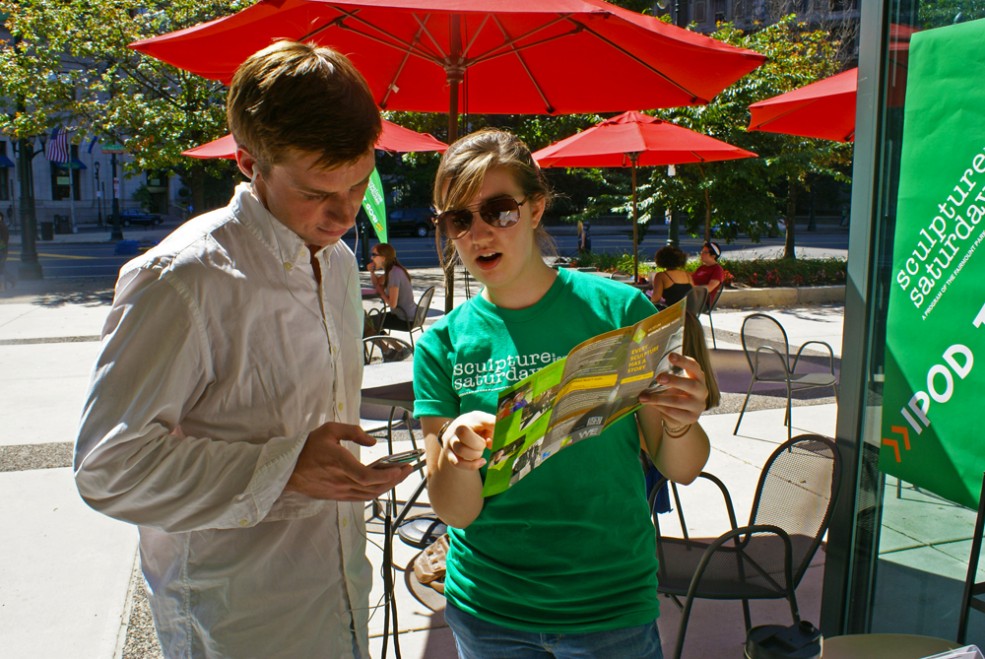 A Public Art Ambassador explains how to experience the aPA's Museum Without Walls™: AUDIO program. Photo Caitlin Martin © 2010 for the Association for Public Art.
