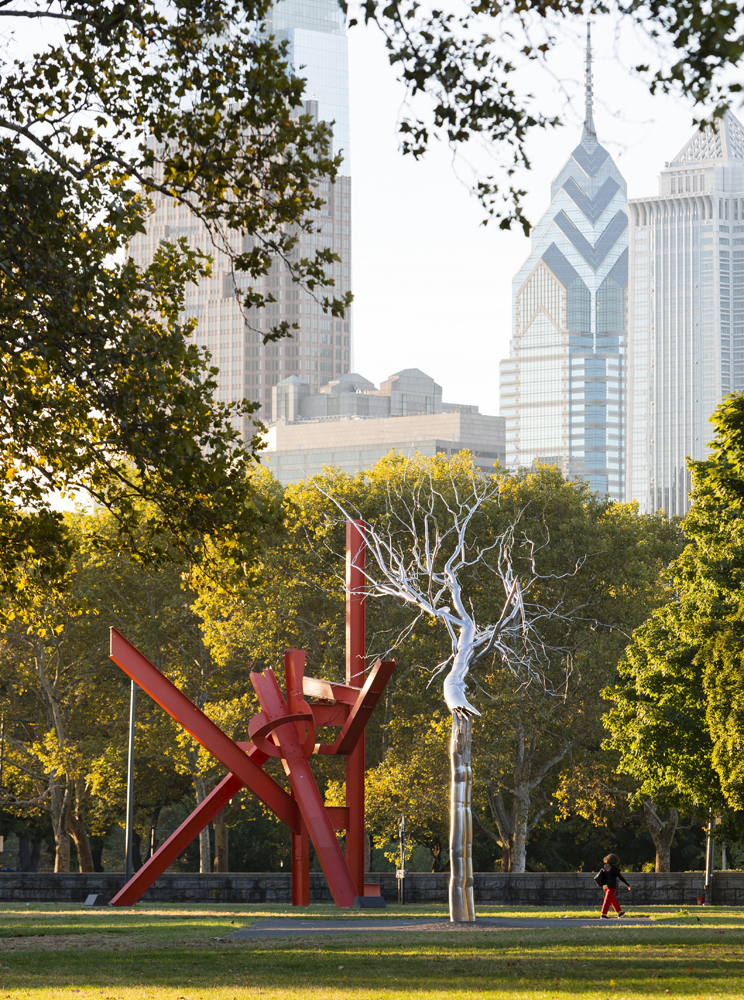 Mark di Suvero's "Iroquois" and Roxy Paine's "Symbiosis" with Philadelphia's skyline in the background
