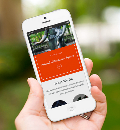 View of person holding a phone showing the aPA responsive website can scale to any screen size