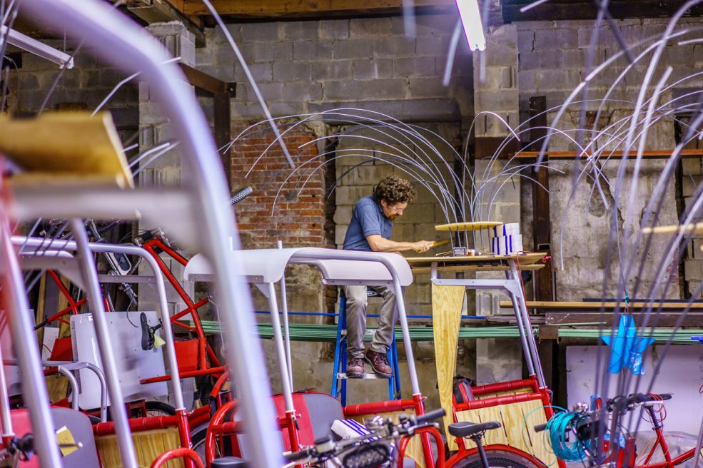 Atelier staff assists with fabrication. Photo Jeff Fusco Photography