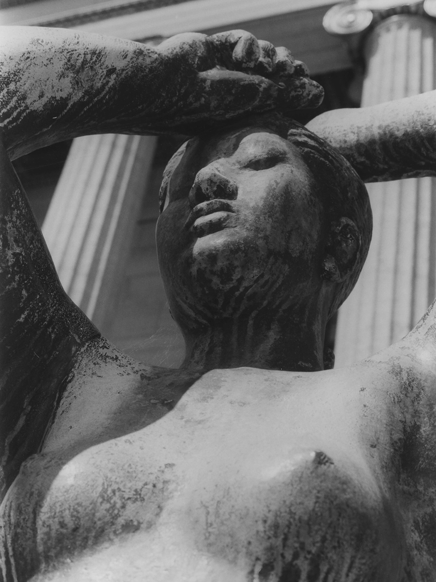 A detail of Maja sculpture, a nude figure with arms overhead