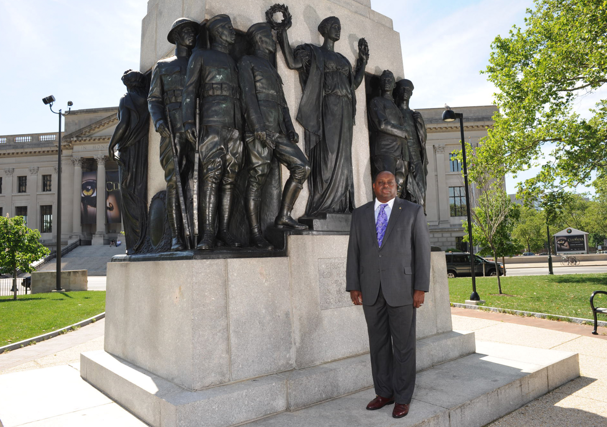 Michael Roepel standing in front of the All Wars Memorial on the Parkway