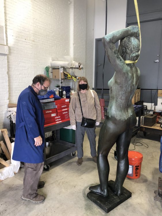 A protective wax coating applied to the lower half of the sculpture. This wax also saturates and darkens the bronze to provide a more unified surface appearance. Photo © Caitlin Matin for the Association for Public Art.