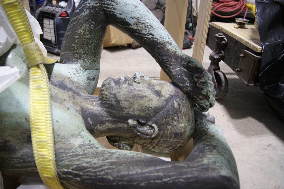 The sculpture resting in the conservator's studio prior to treatment. Photo © Caitlin Matin for the Association for Public Art.